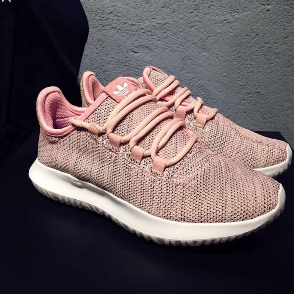 Light pink adidas tubular shadows